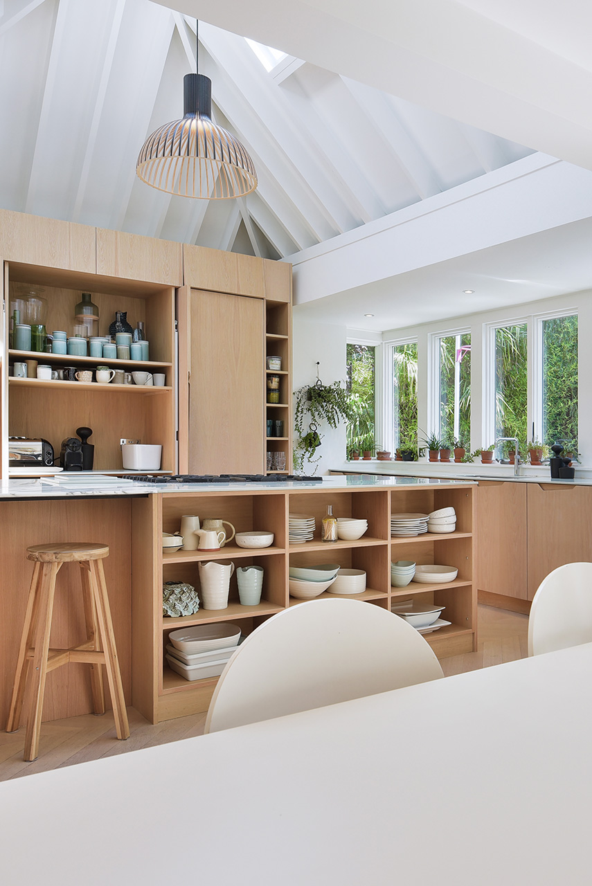 Wood and bright white kitchen by London-based interior photographer