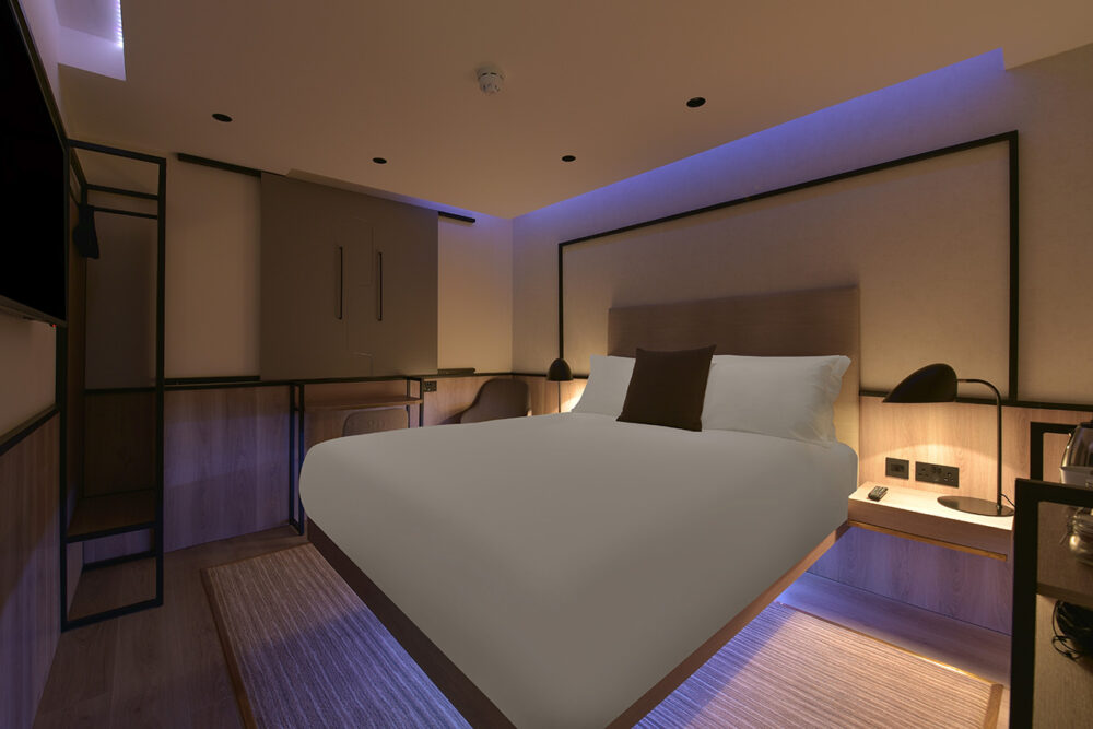 Interior photograph of bedroom with curtains drawn