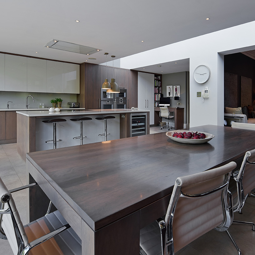 open plan kitchen with dark wood