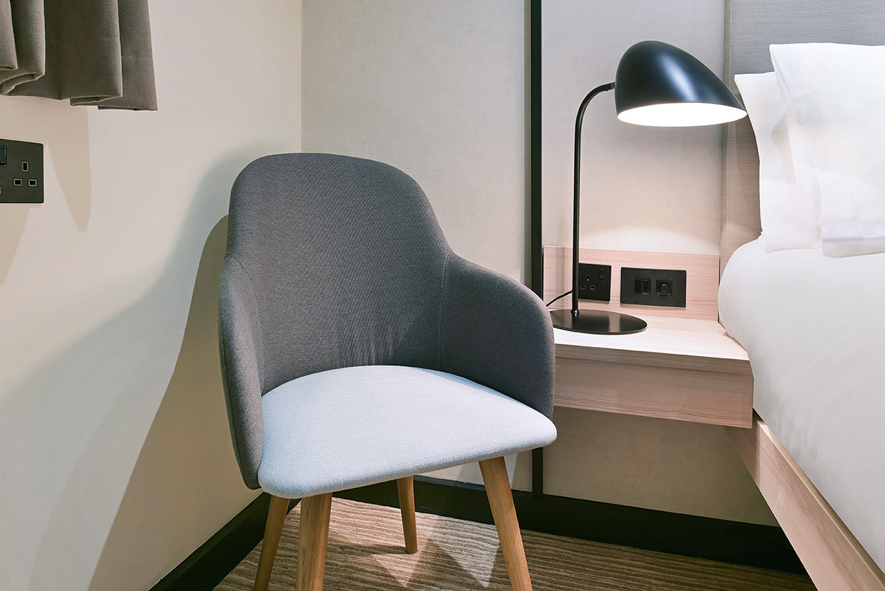 interior photographer professional photo of chair in bedroom