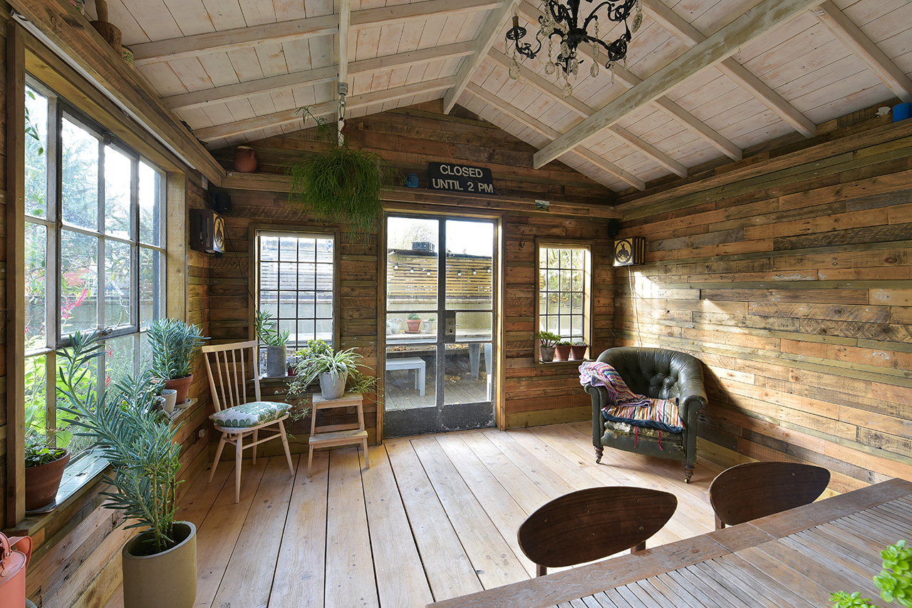 garden room design - luxury shed interior photo