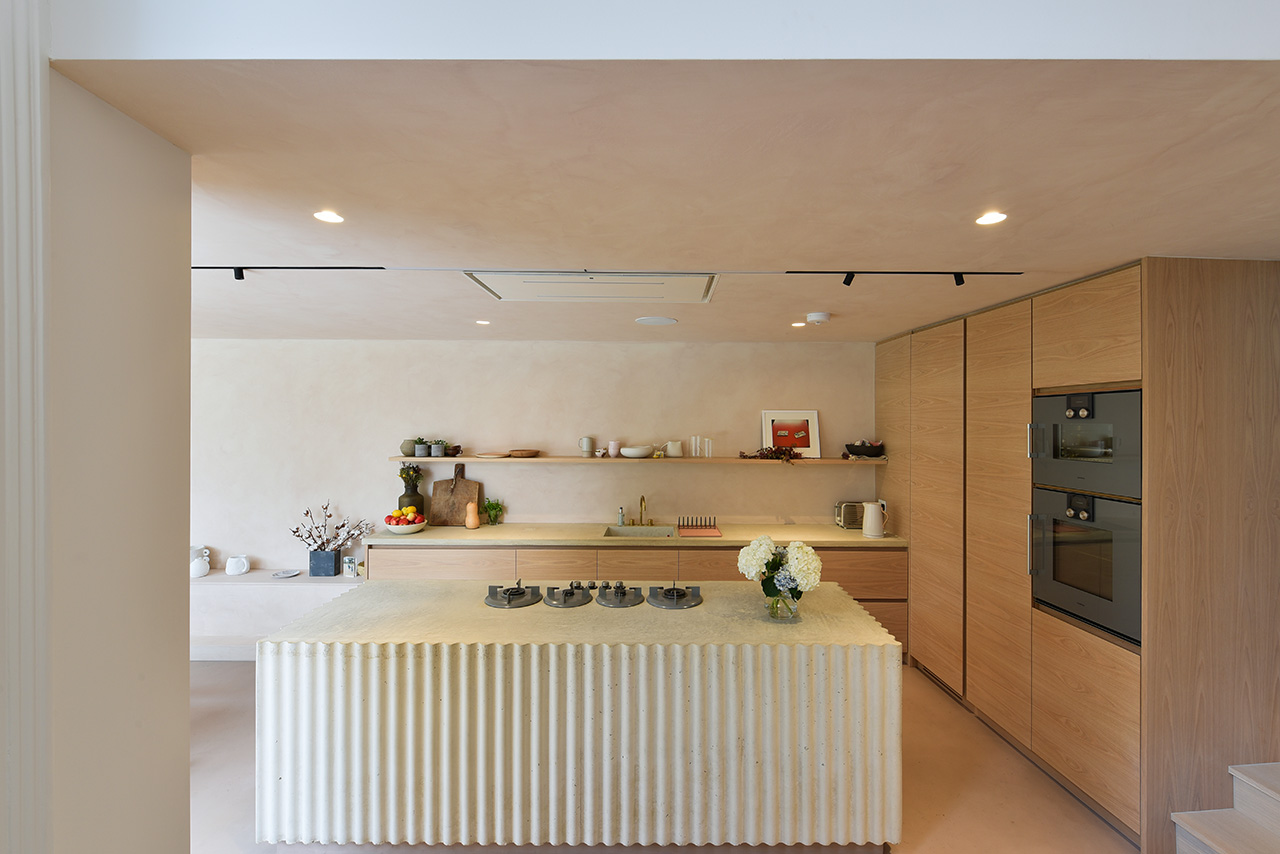 modern kitchen interior design photograph with yellow hue