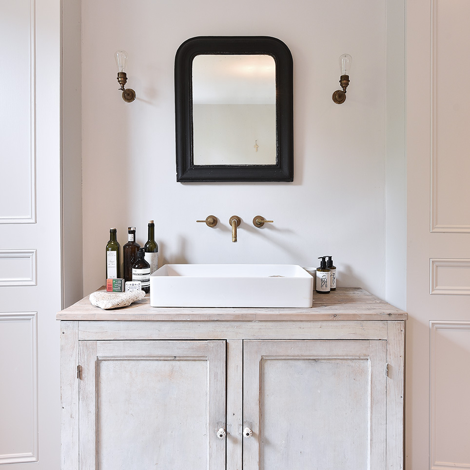 creamy pink bathroom editorial photo