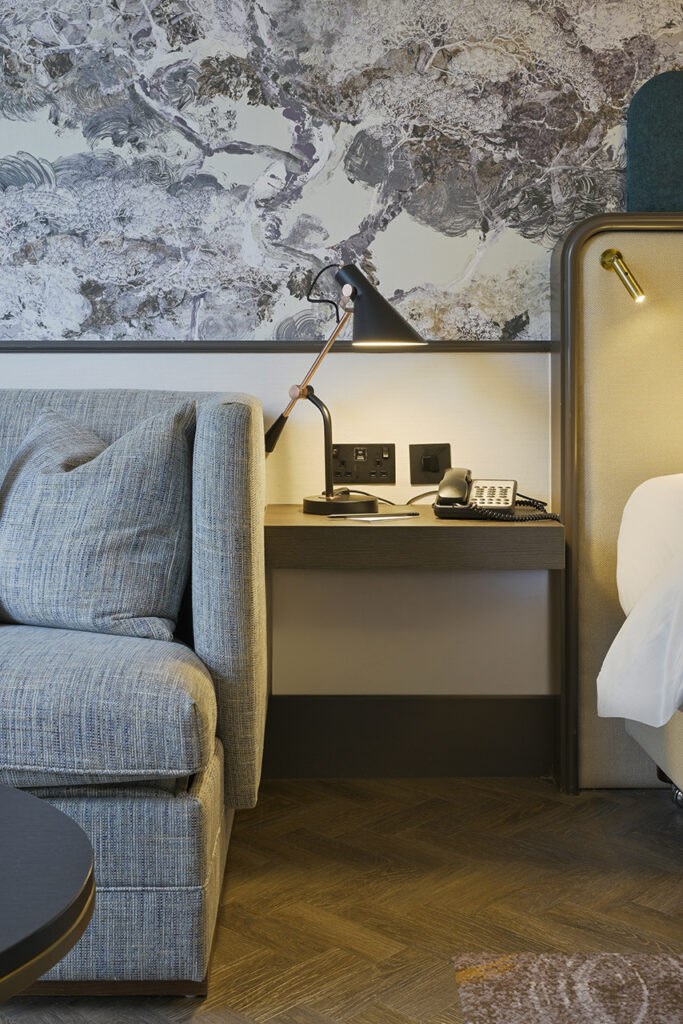 interior photography of side table with lamp and phone