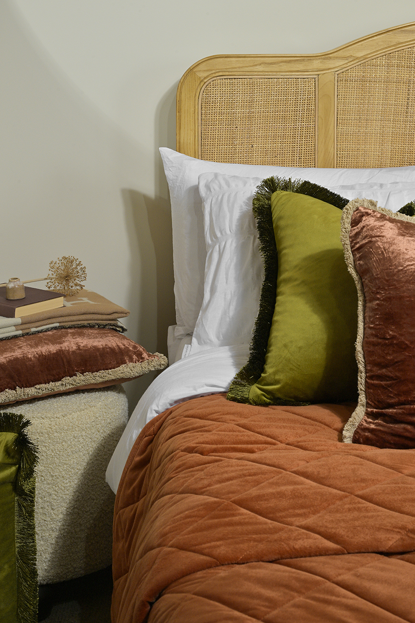 interior soft furnishings on wooden bed